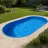 Piscines ovales : une forme esthétique et pratique pour tous les jardins