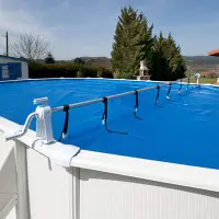 Couvertures piscines : tarifs et infos sur bâches, abris, volets