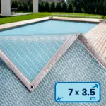 Bâche à bulles Aqualux DEL 7x3.50m alvéolaire ultra-chauffante - bordée 4 cotés - Gris Translucide